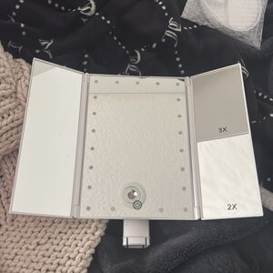 white folding makeup mirror